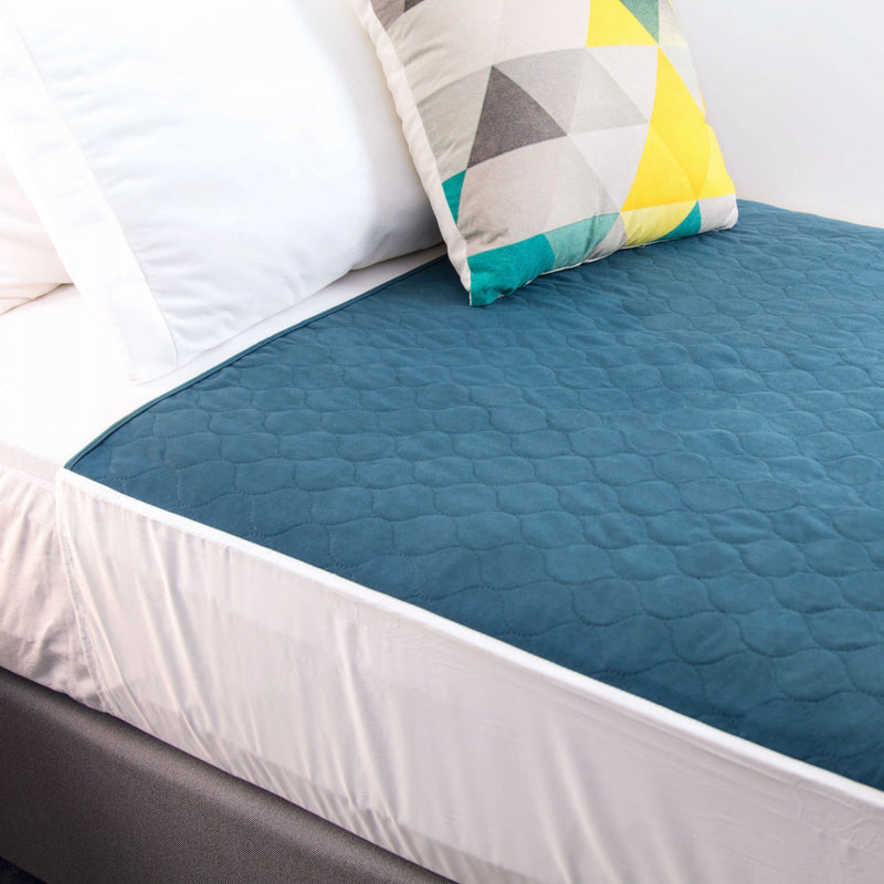 Conni Bed Pad with Tuck-ins