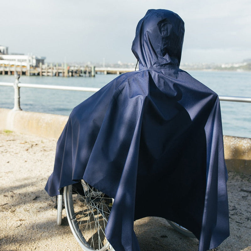 Man wearing Wheelchair Rain Coat outdoor back