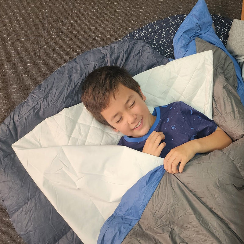 boy smile sleeping in cotton waterproof sleeping bag